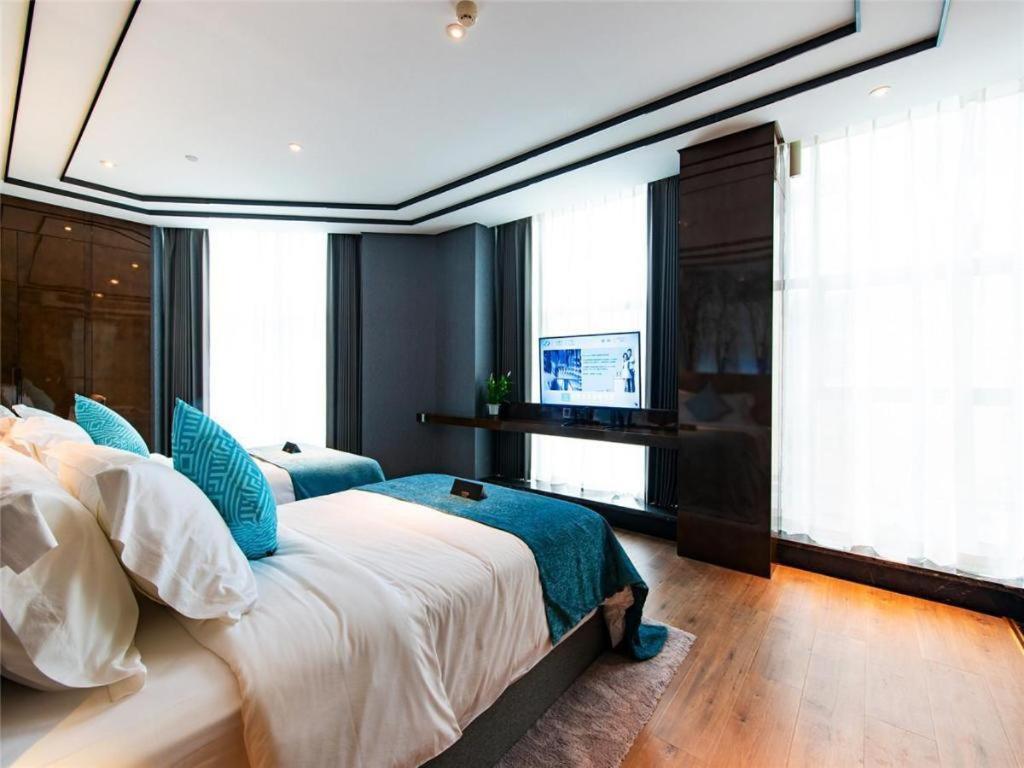 Xana Hotelle-Hotel Luzhou Baizitu Square Exteriör bild