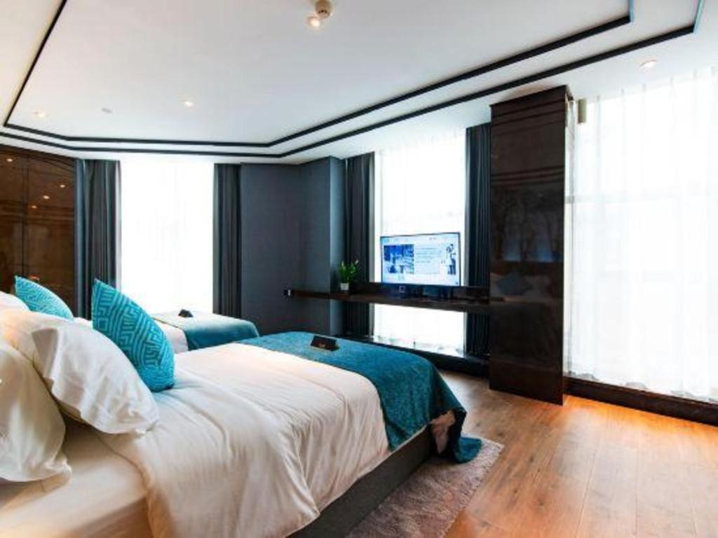 Xana Hotelle-Hotel Luzhou Baizitu Square Exteriör bild