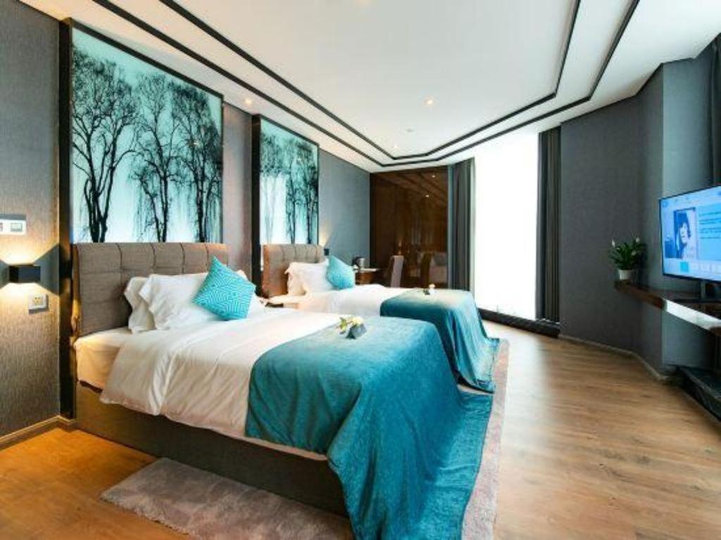 Xana Hotelle-Hotel Luzhou Baizitu Square Exteriör bild
