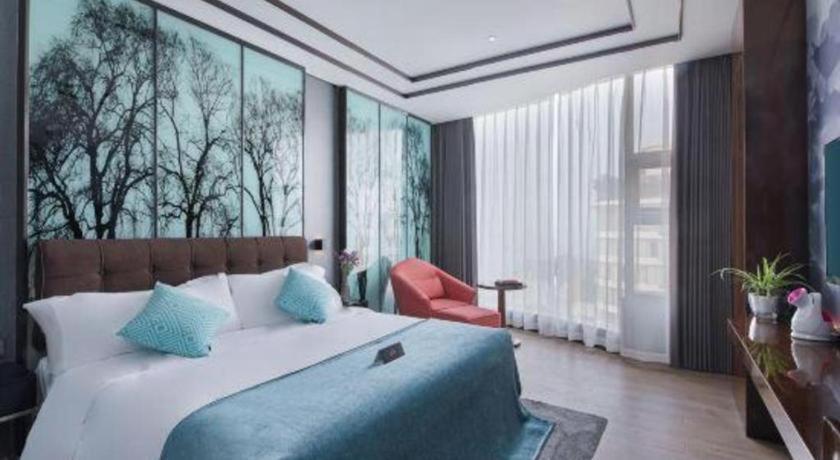 Xana Hotelle-Hotel Luzhou Baizitu Square Exteriör bild